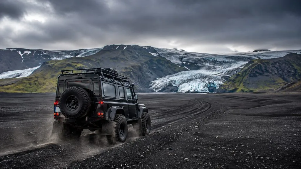 Super jeep crossing the ash plains toward Myrdalsjokull glacier